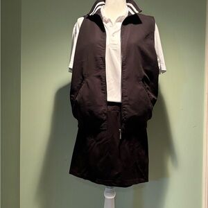 Izod women’s black zip up golf vest size M